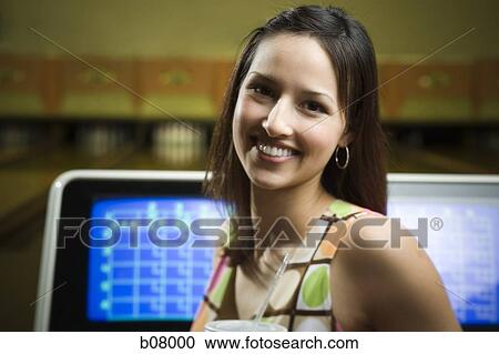 Woman at bowling alley View Large Photo Image Stock Image - Woman at bowling alley. Fotosearch