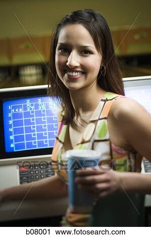 Woman at bowling alley View Large Photo Image Stock Image - Woman at bowling alley. Fotosearch