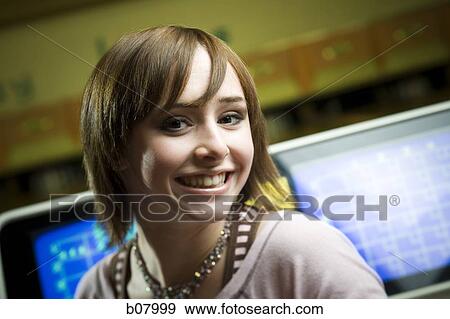 Woman at bowling alley View Large Photo Image Stock Photo - Woman at bowling alley. Fotosearch