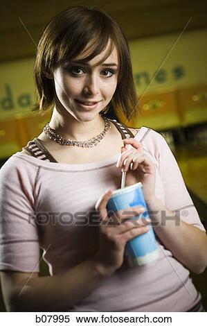 Woman at bowling alley View Large Photo Image Stock Photography - Woman at bowling alley. Fotosearch