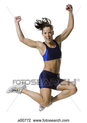 Stock Image - Woman athlete jumping. Fotosearch