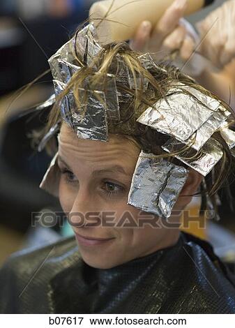 Woman getting her hair dyed View Large Photo Image Stock Photo - Woman getting her hair dyed. Fotosearch