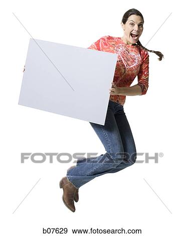 Woman holding a blank sign View Large Photo Image Stock Photo - Woman holding a blank sign. Fotosearch