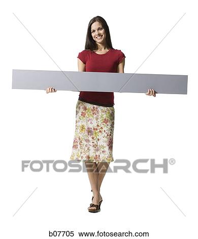 Woman holding a blank sign View Large Photo Image Stock Photography - Woman holding a blank sign. Fotosearch