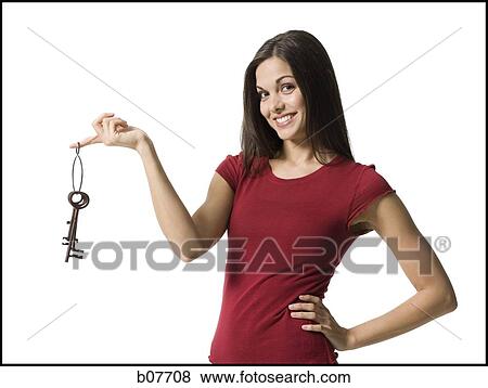 Woman holding a set of skeleton keys View Large Photo Image Stock Photo - Woman holding a set of skeleton keys. Fotosearch