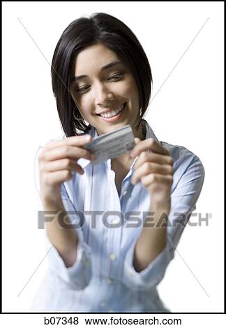 Woman holding credit card View Large Photo Image Stock Photo - Woman holding credit card. Fotosearch