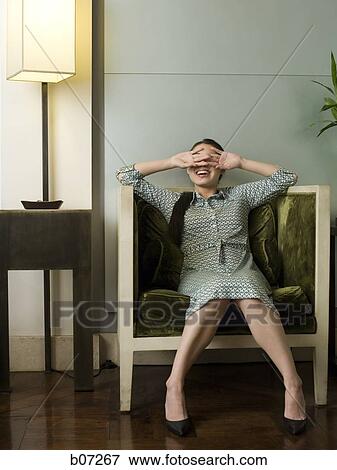 Woman in hotel lobby View Large Photo Image Stock Photo - Woman in hotel lobby. Fotosearch