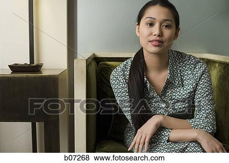 Woman in hotel lobby View Large Photo Image Stock Photo - Woman in hotel lobby. Fotosearch