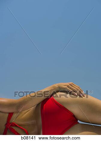 Woman in red bikini View Large Photo Image Stock Image - Woman in red bikini. Fotosearch