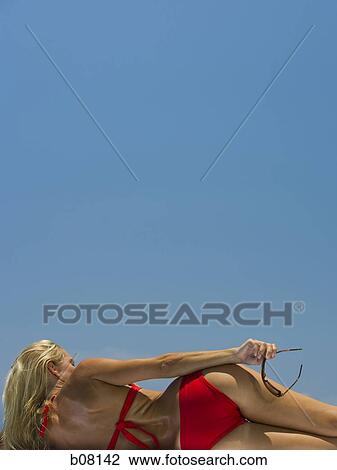 Woman in red bikini View Large Photo Image Stock Image - Woman in red bikini. Fotosearch