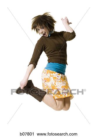 Stock Image - Woman jumping. Fotosearch
