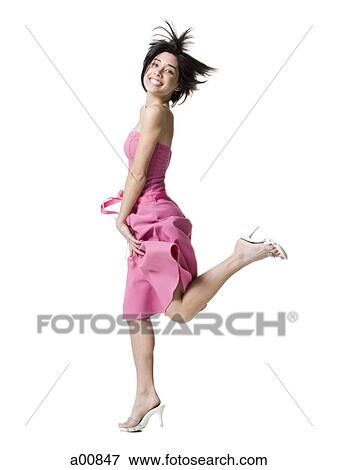 Stock Photo - Woman jumping with high heels. Fotosearch