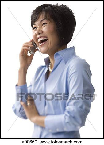 Stock Image - Woman on a cell phone. Fotosearch