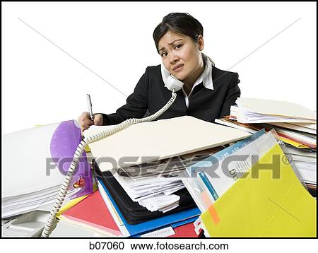 Woman on telephone with stack of binders View Large Photo Image Stock Image - Woman on telephone with stack of binders. Fotosearch