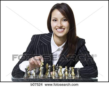 Picture - Woman playing chess. Fotosearch
