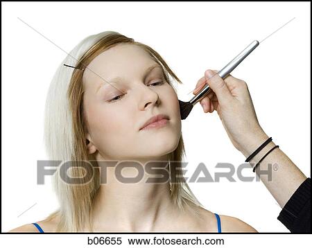 Woman receiving cosmetic application View Large Photo Image Stock Photography - Woman receiving cosmetic application. Fotosearch