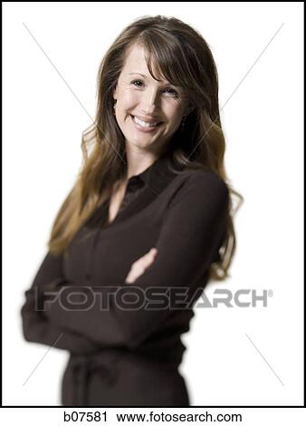 Woman smiling and posing View Large Photo Image Stock Image - Woman smiling and posing. Fotosearch