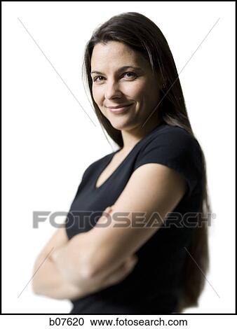Woman smiling and posing View Large Photo Image Stock Image - Woman smiling and posing. Fotosearch