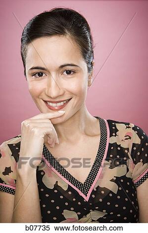 Woman smiling and posing View Large Photo Image Stock Photography - Woman smiling and posing. Fotosearch
