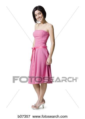 Woman smiling and standing with high heels View Large Photo Image Stock Photo - Woman smiling and standing with high heels. Fotosearch