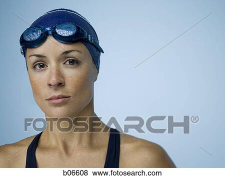 Woman with bathing cap and goggles View Large Photo Image Stock Photo - Woman with bathing cap and goggles. Fotosearch