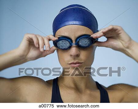 Woman with bathing cap and goggles View Large Photo Image Stock Photography - Woman with bathing cap and goggles. Fotosearch