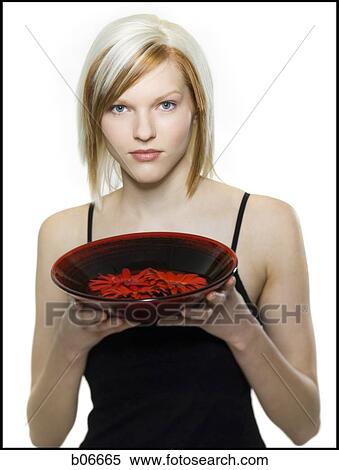 Woman with bowl of flower petals View Large Photo Image Stock Photography - Woman with bowl of flower petals. Fotosearch