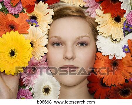 Woman with flower blossoms View Large Photo Image Stock Photo - Woman with flower blossoms. Fotosearch