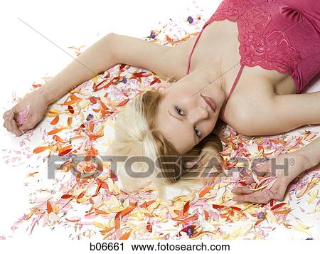Woman with flower petals View Large Photo Image Stock Image - Woman with flower petals. Fotosearch
