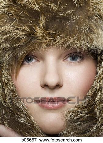 Woman with fur hat View Large Photo Image Stock Photo - Woman with fur hat. Fotosearch
