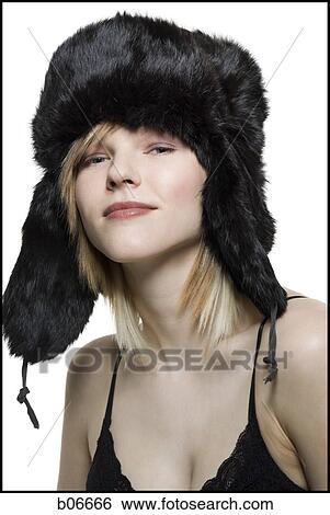 Stock Photograph - Woman with fur hat. Fotosearch