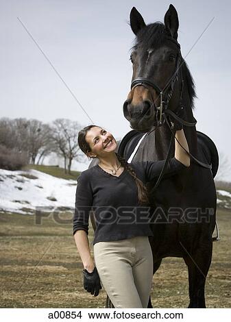 Woman with horse View Large Photo Image Picture - Woman with horse. Fotosearch