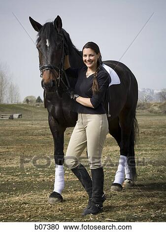 Woman with horse View Large Photo Image Stock Image - Woman with horse. Fotosearch