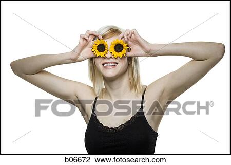 Woman with sunflower eyes View Large Photo Image Stock Image - Woman with sunflower eyes. Fotosearch