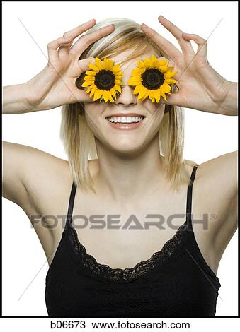Woman with sunflower eyes View Large Photo Image Stock Image - Woman with sunflower eyes. Fotosearch