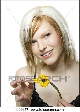 Stock Photo - Woman with sunflower. Fotosearch