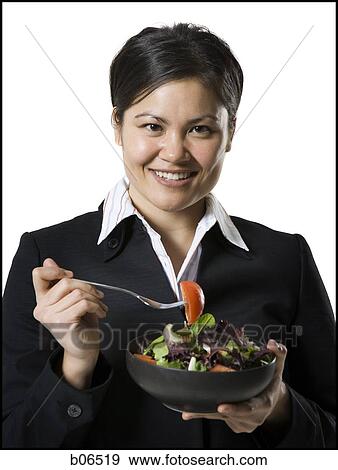 Woman with tossed salad View Large Photo Image Stock Photo - Woman with tossed salad. Fotosearch