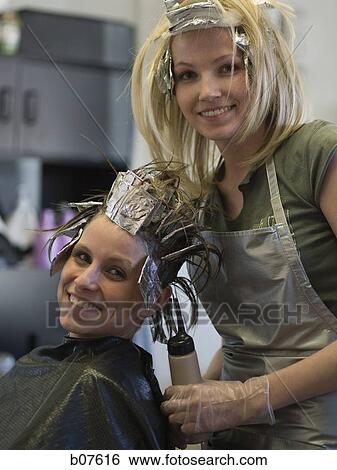 Women dyeing their hair together View Large Photo Image Stock Photograph - Women dyeing their hair together. Fotosearch