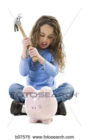 Young girl breaking piggy bank with hammer View Large Photo Image Stock Photography - Young girl breaking piggy bank with hammer. Fotosearch