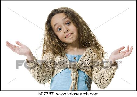 Young girl gesturing with hands in air View Large Photo Image Stock Photo - Young girl gesturing with hands in air. Fotosearch