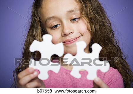 Stock Photo - Young girl holding cookie jar. Fotosearch