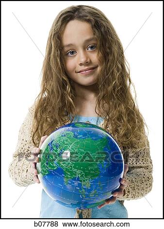 Young girl holding earth globe View Large Photo Image Stock Photo - Young girl holding earth globe. Fotosearch