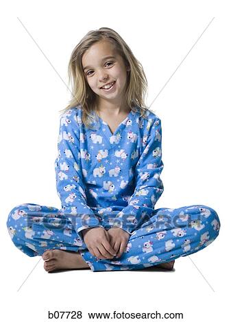 Stock Photo - Young girl in pajamas. Fotosearch