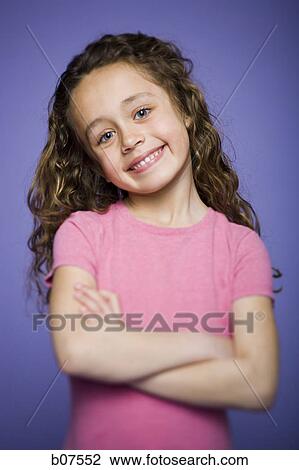 Stock Image - Young girl posing. Fotosearch