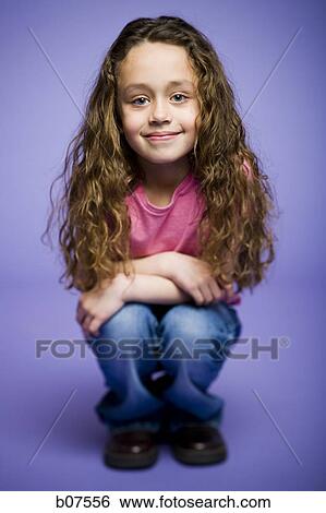 Young girl posing View Large Photo Image Stock Photograph - Young girl posing. Fotosearch