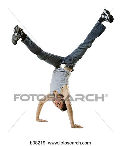 Stock Photo - Young man break dancing. Fotosearch