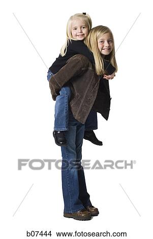 Picture - Young sisters posing. Fotosearch