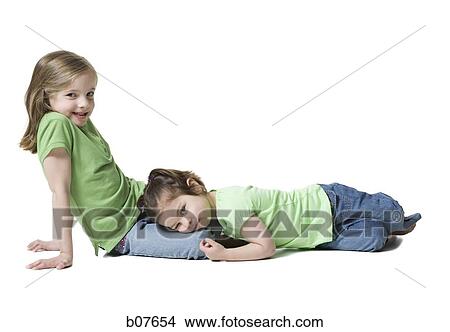 Young sisters posing View Large Photo Image Picture - Young sisters posing. Fotosearch