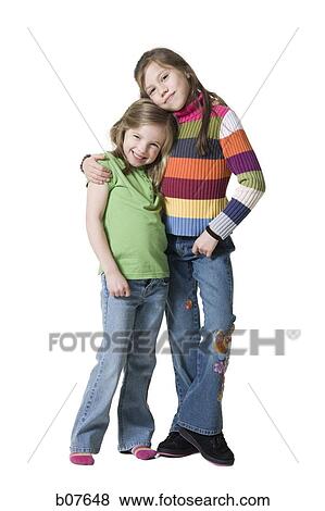 Young sisters posing View Large Photo Image Stock Photo - Young sisters posing. Fotosearch
