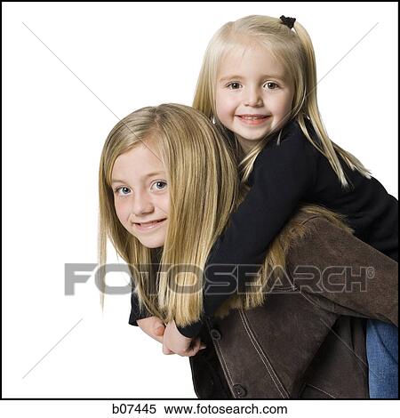 Young sisters posing View Large Photo Image Stock Photography - Young sisters posing. Fotosearch
